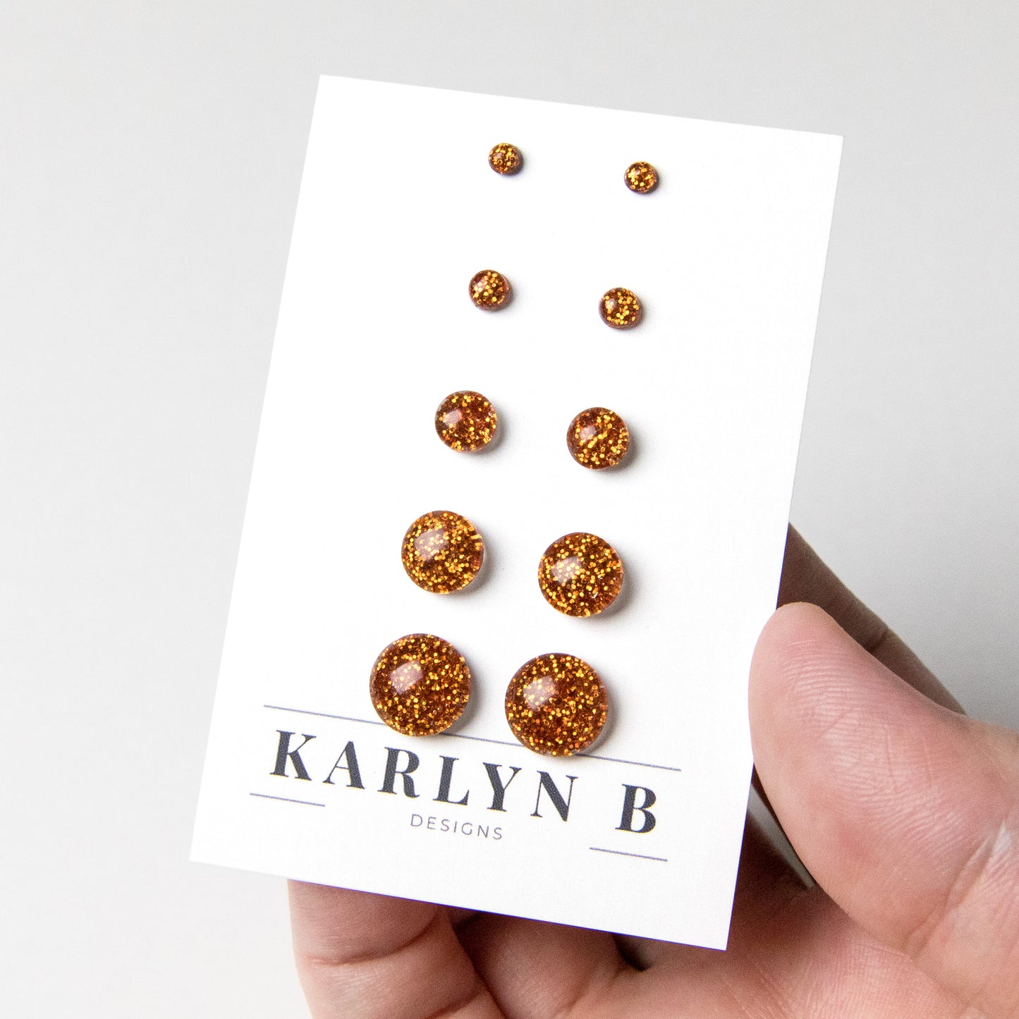 Color Dot Stud Earrings in Orange Glitter