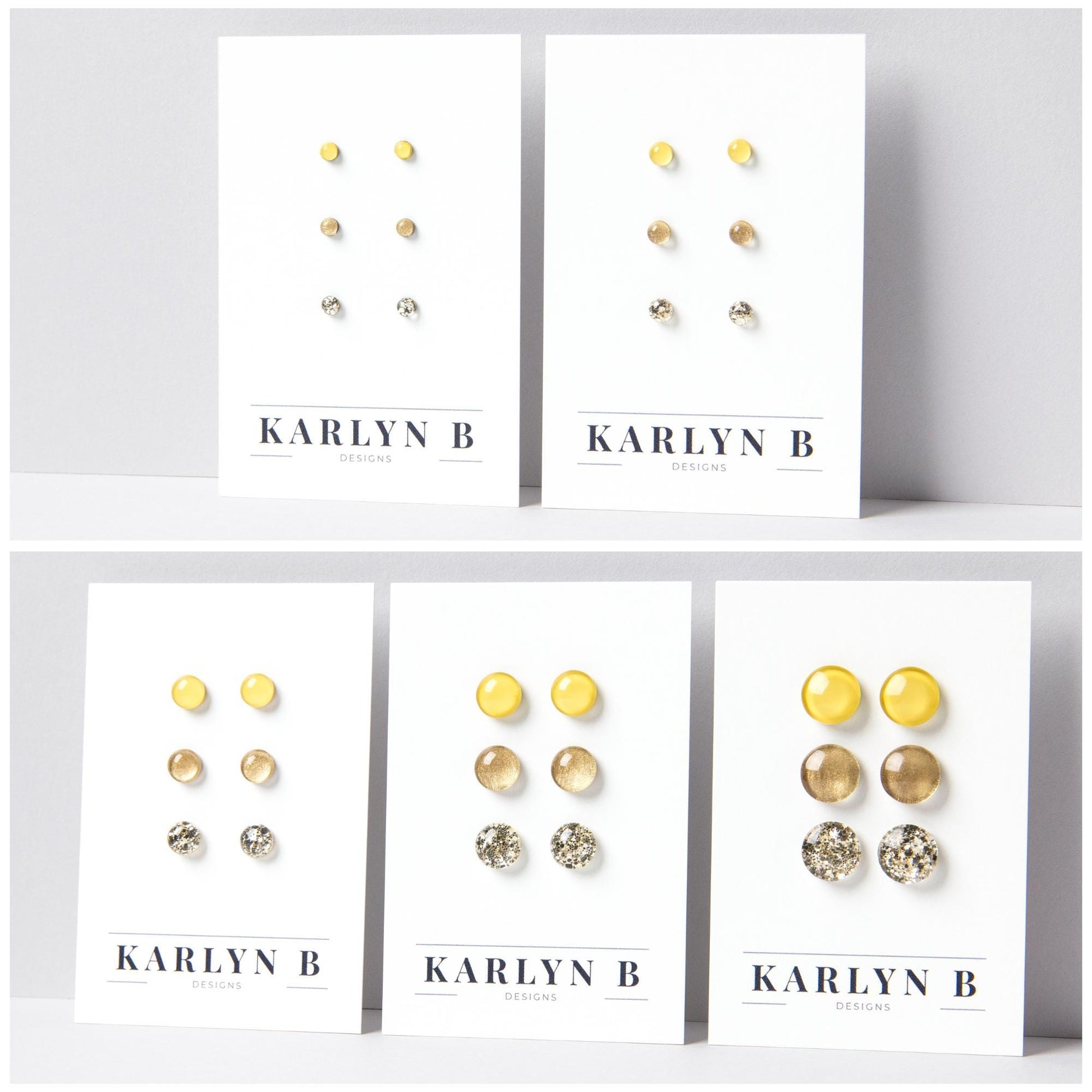 Five sets of stud earrings on white cards with the text "KARLYN B DESIGNS". Each set features three pairs of earrings in different shades of warm yellow, gold and gold glitter.