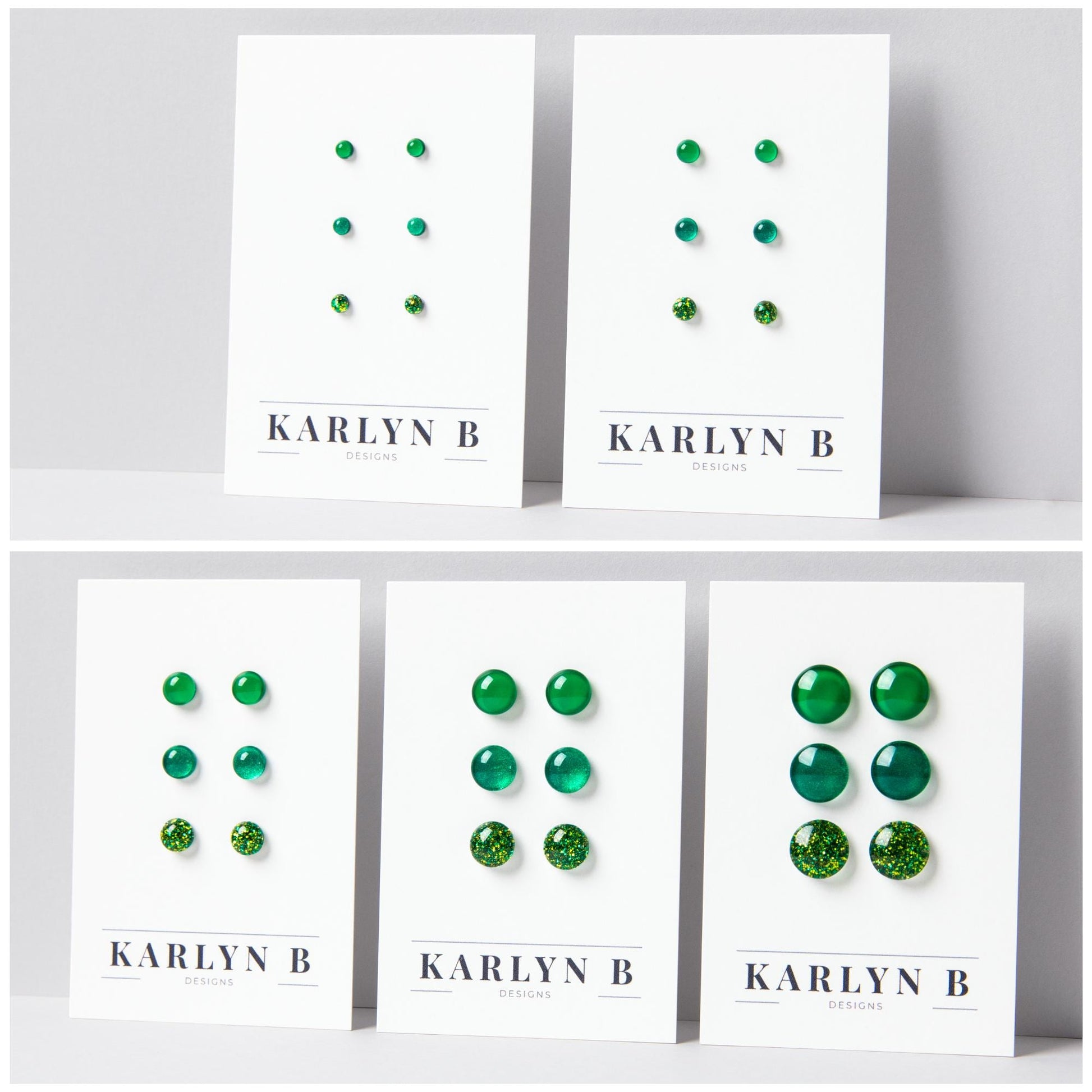 Five sets of stud earrings on white cards with the text "KARLYN B DESIGNS". Each set features three pairs of earrings in different shades of green.